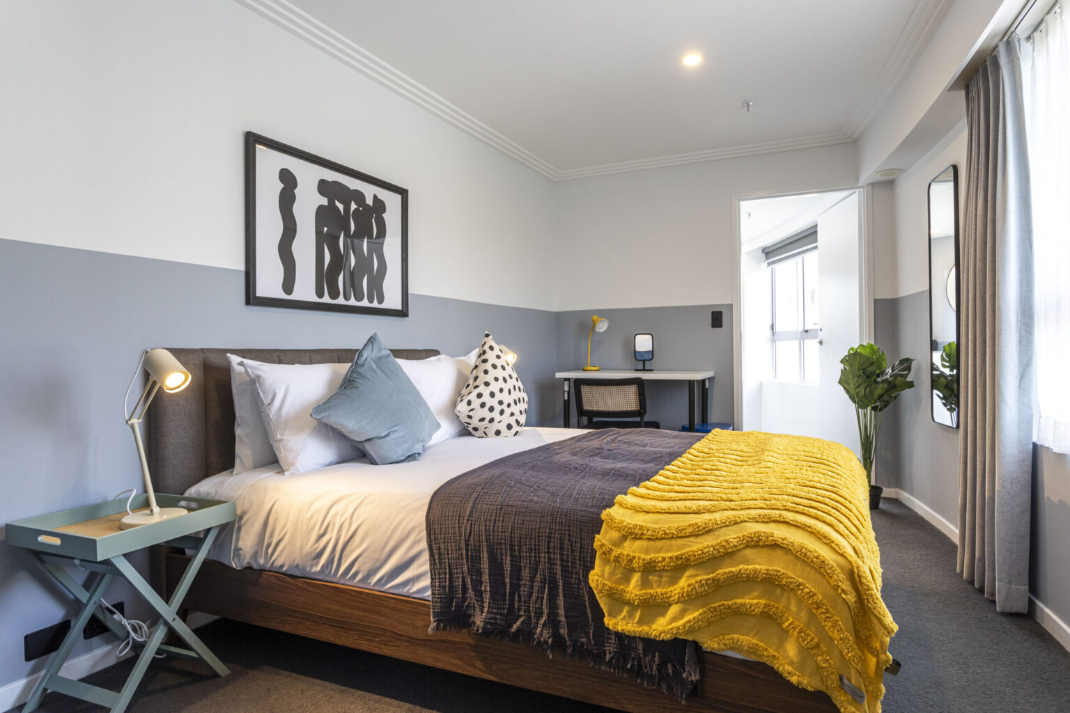 Bed made with hotel-grade hire linen