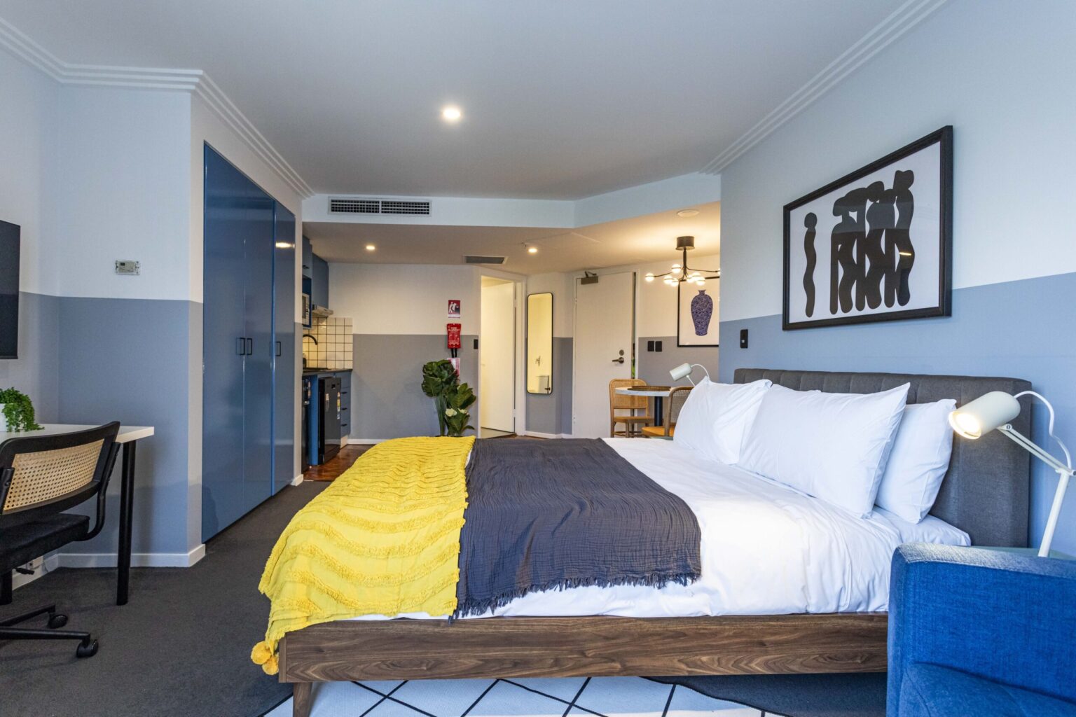 Freshly made bed after a short-stay turnover, Sydney
