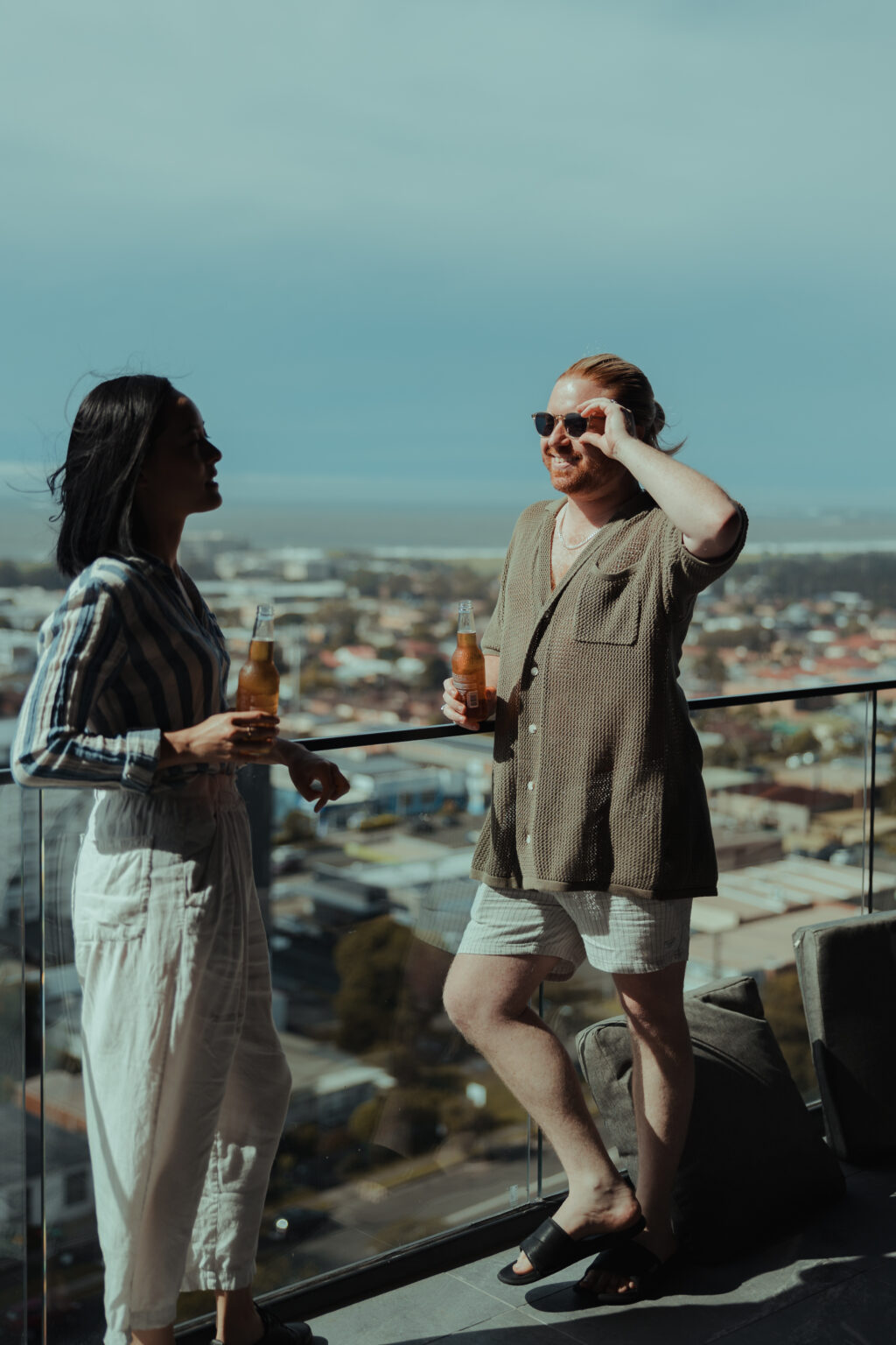 Group of guests on a Wollongong apartment balcony